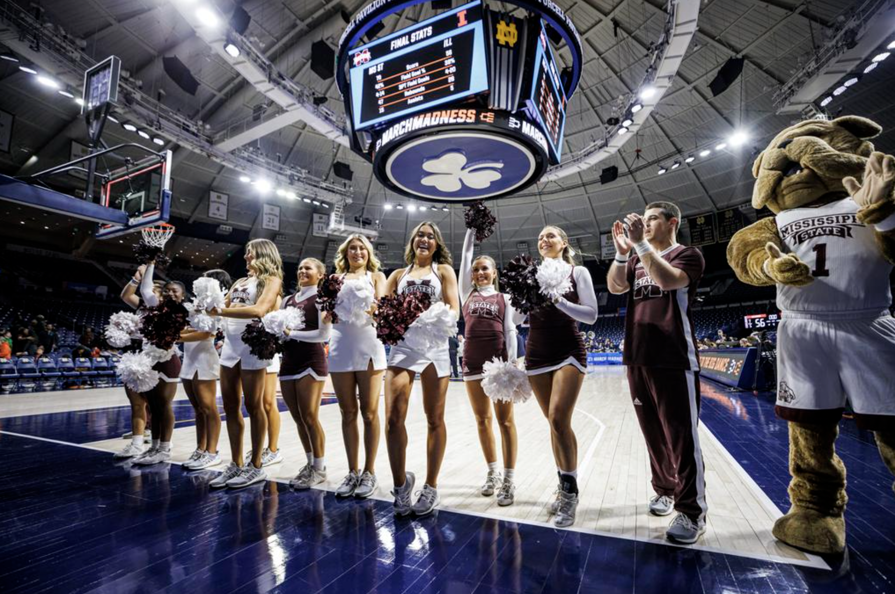 Mississippi State cheerleaders and mascot celebrate after beating the Illinois Fighting Illini during the NCAA Women's basketball tournament. Photo: Kevin Snyder/Mississippi State athletics.